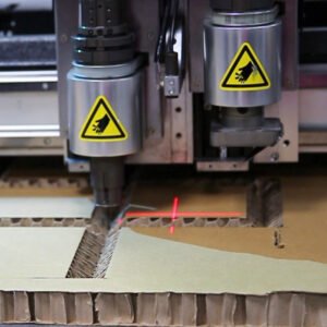 Corrugated board cutting